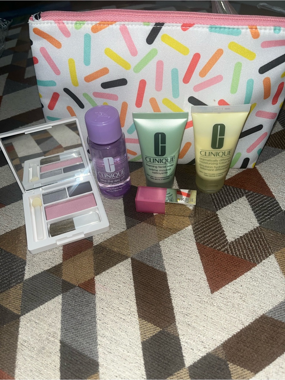 New 
Clinique Skincare & Makeup W/Pouch